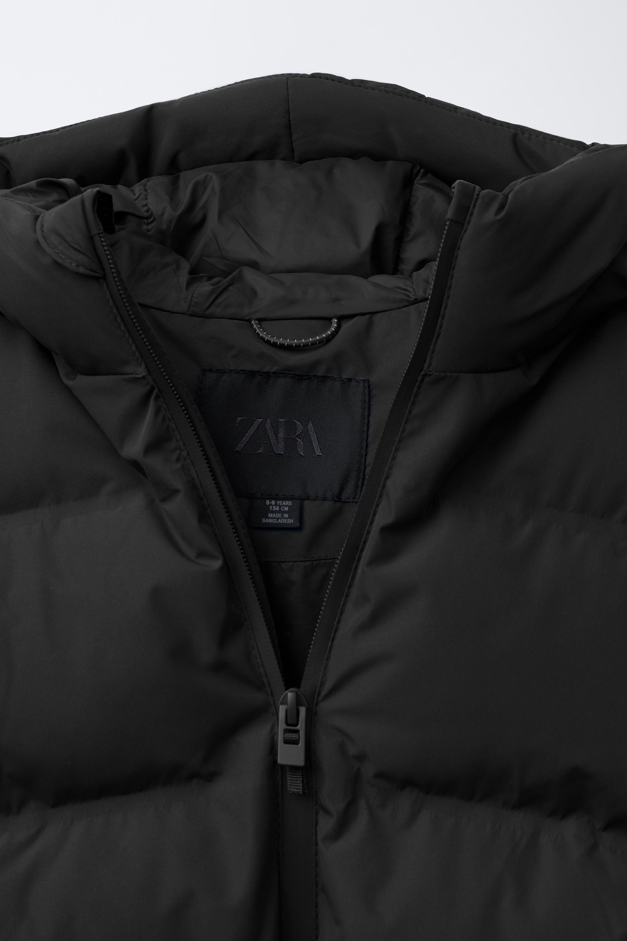 WATER REPELLENT PUFFER COAT WITH LABEL
